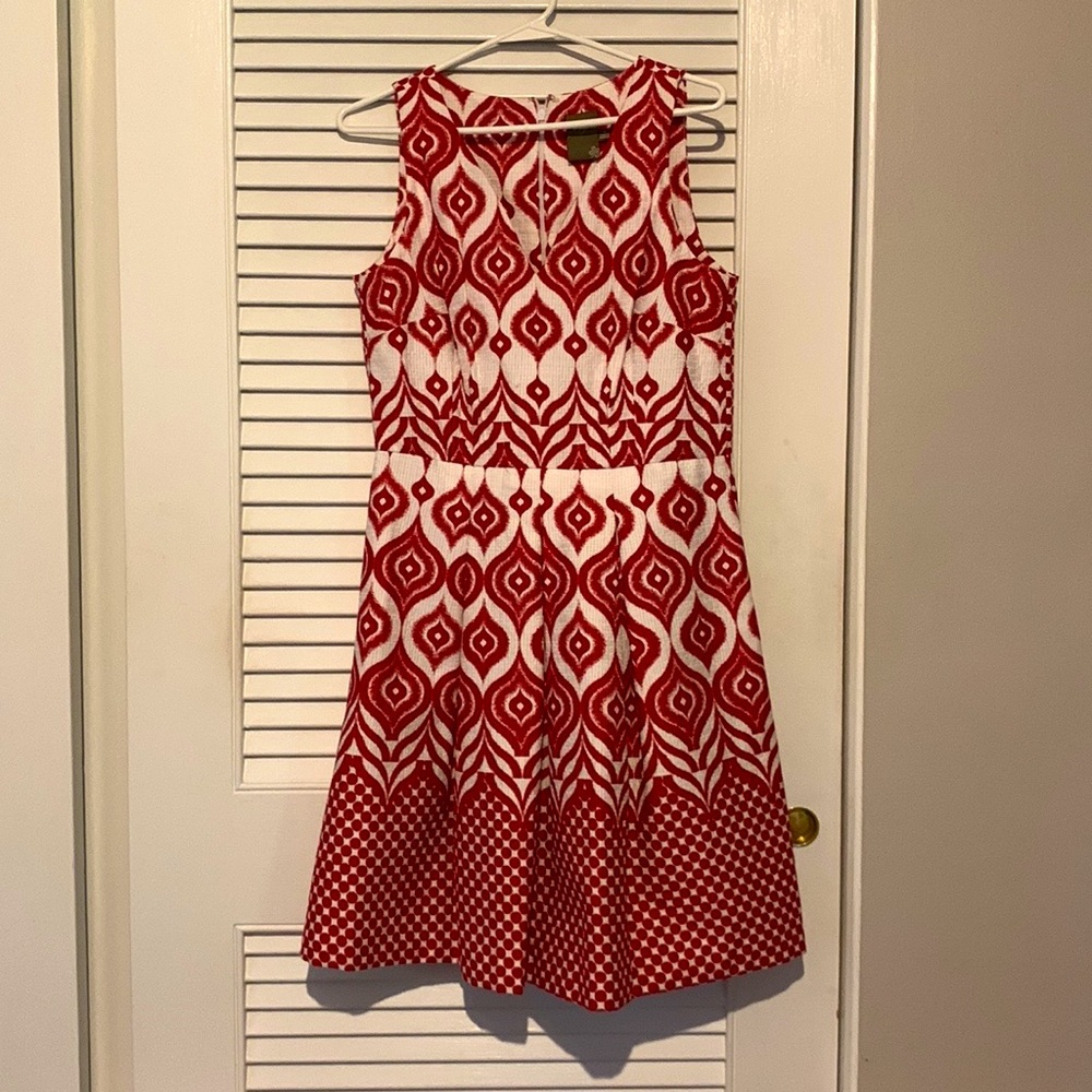 Beautiful fitted flared cotton dress. Dark red and white design. Lined. Size 4.